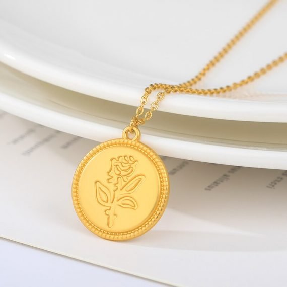 embossed rose flower circle emblem necklace